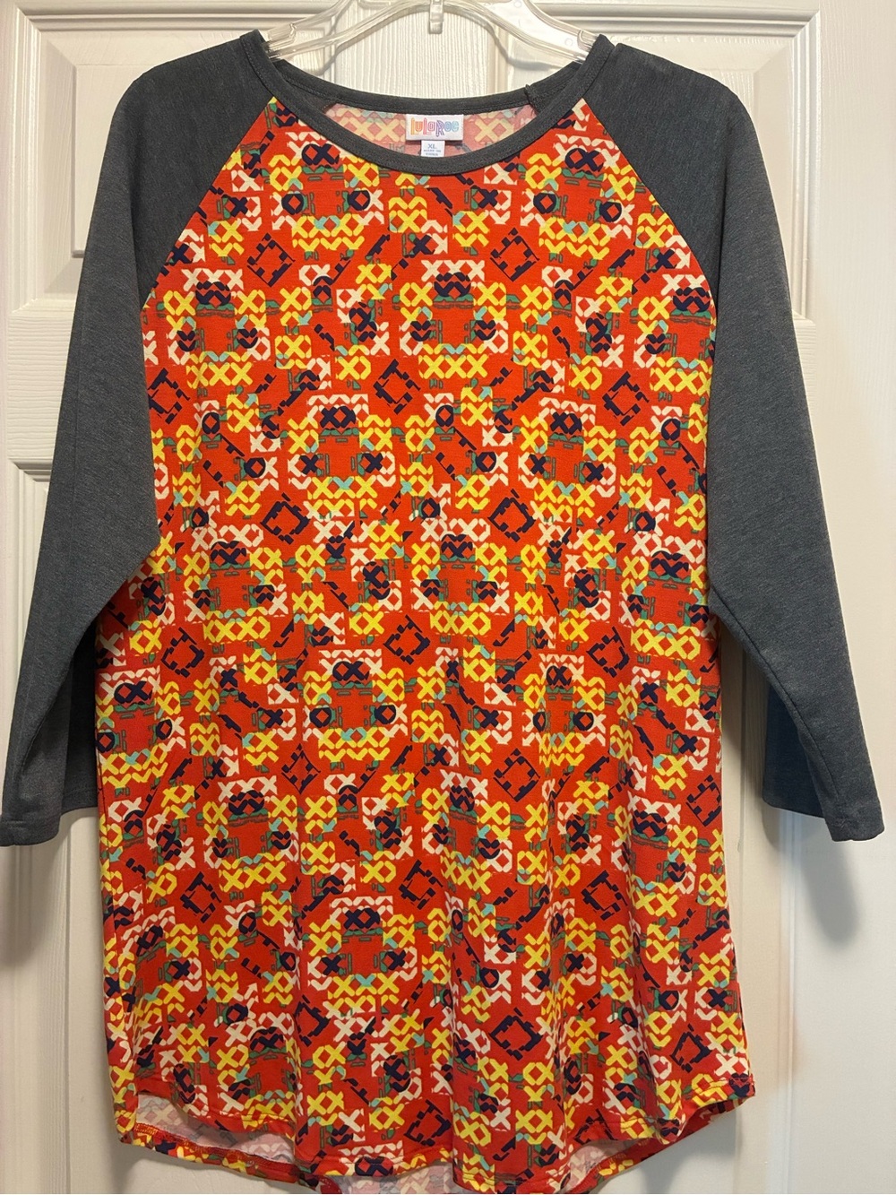 LuLaRoe Randy Orange Geometric Tee size XL